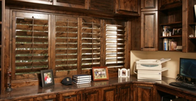  Wood shutters in home office.
